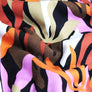 ABSTRACT LEAVES - BURNT ORANGE VISCOSE JERSEY 98% VISCOSE 2% SPANDEX 145cm WIDE