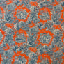 A close-up of a fabric pattern featuring a vibrant orange background with a detailed blue toile-style print of palm trees, tropical foliage, and small architectural scenes.
THE DRESSMAKER FABRICS
DRESSMAKING